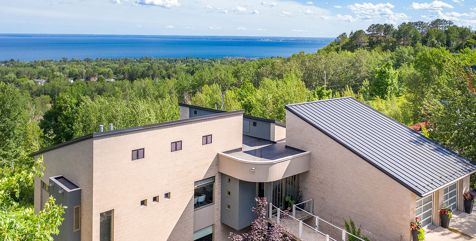 modern style house beside a forrest